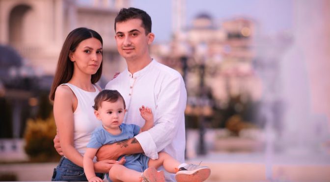 Charming family enjoying a day outdoors in Ankara, capturing delightful emotions.